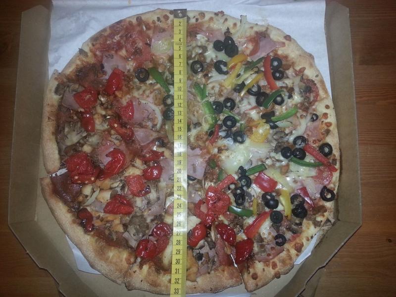 Odkryj rozmiar pizzy XXL w Domino’s – ile ma centymetrów tej ogromnej pyszności?